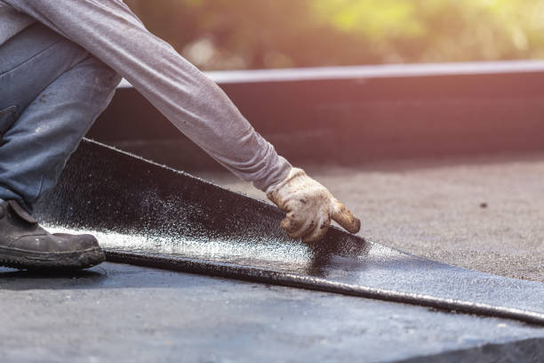 Professional Basement Waterproofing technician working in Manchester, MD